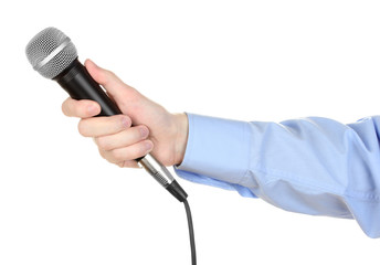 Male hand with microphone isolated on white