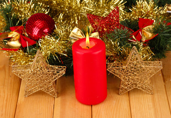 Christmas composition  with candles and decorations in red and