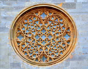 Rose stained glass window on Stephansdom facade in Vienna
