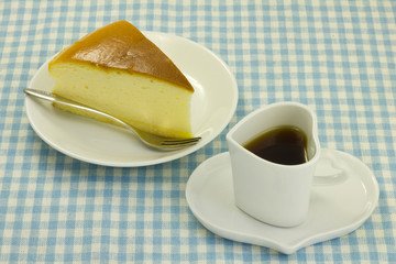cheese cake and coffee on the table