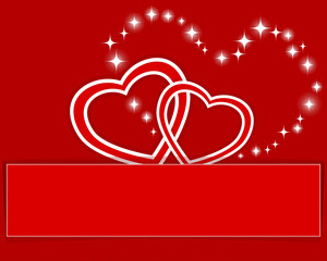 Two paper hearts with banner.