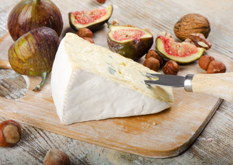 Cheese  on wooden platter