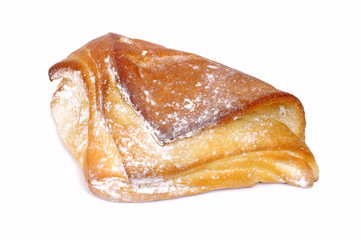 Bun with sugar on the white background