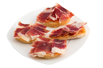 Spanish tapas, ham and tomato