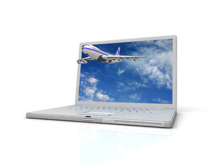 Professional Laptop and flying jet airplane