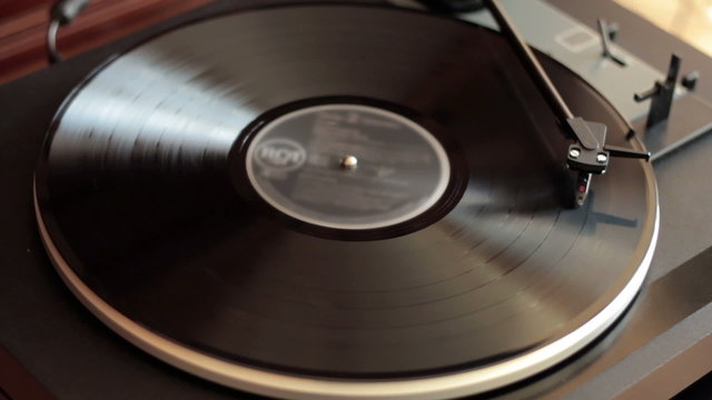 Vinyl rotating on a turntable, top view
