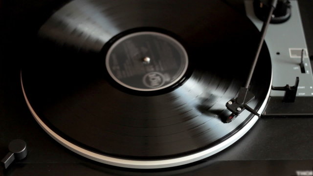 Vinyl rotating on a turntable, top view