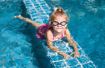 little girl in the pool