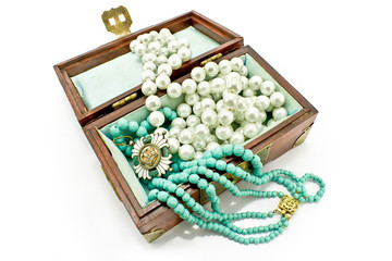 Wooden treasure chest with jewelry