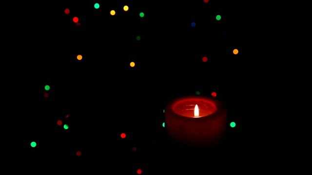 Christmas candle on the background the Christmas tree