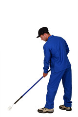 Man painting the floor