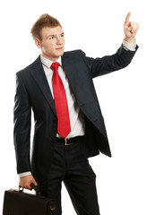 A young man pointing something isolated on white background