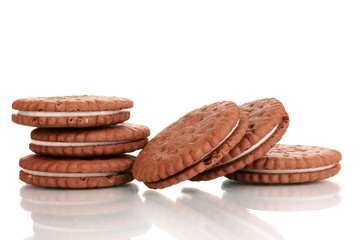Chocolate cookies with creamy layer isolated on white