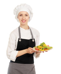 Pretty cook chief holding salad