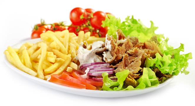 Plate of kebab and vegetables