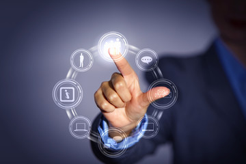Fototapeta premium hand pushing on a touch screen
