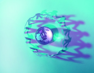 Team of paper doll people holding hands