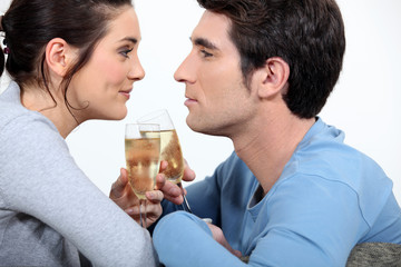Couple having a glass of champagne