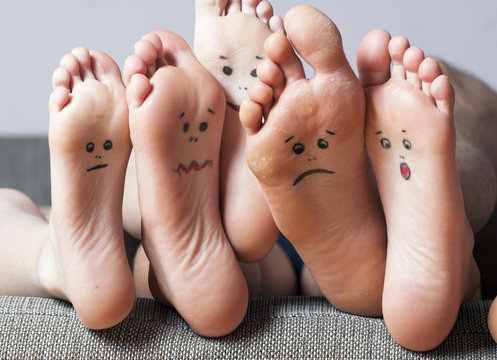 Close up of human soles with smiles