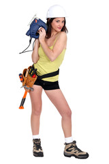 Sexy woman with chainsaw