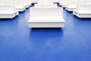 White seat or bench on a ferry boat as background