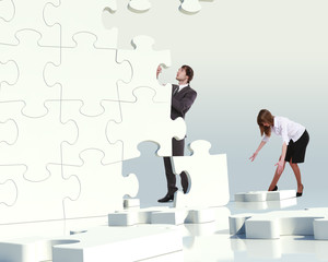 Businessman with a puzzle pieces