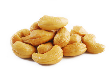 Salted cashews on white background