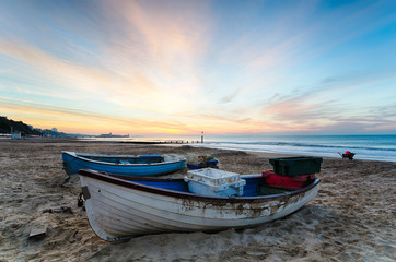Blue & White Boats on Beach at Sunrise