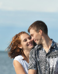 loving young couple at sea