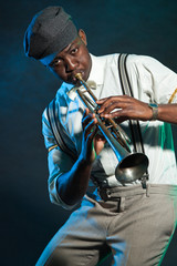 Black american jazz trumpet player. Vintage. Studio shot.