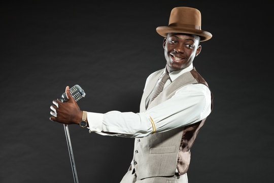 Black american jazz singer. Vintage. Studio shot.