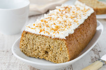 orange cake with cream cheese icing, horizontal