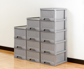 Stacks of plastic drawers for home or office using