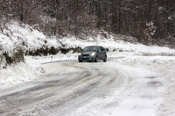 car on snowy road