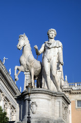 Fototapeta na wymiar Statue near Palazzo Senatorio at Capitoline Hill. Roma, Italy