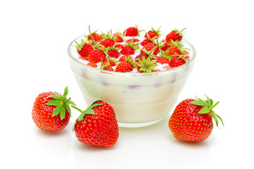 wild strawberry and garden strawberries on a white background