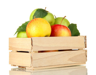 sweet apples in wooden crate, isolated on white