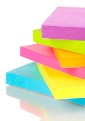 Stack of colorful Sticky Notes isolated on white