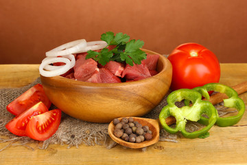 Raw beef meat with herbs and spices