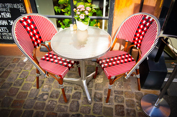 Vintage old fashioned cafe chairs with table in Copenhagen, Denm