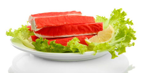 Crab sticks with lettuce leaves and lemon