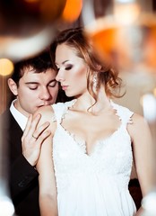 Bride and groom glass on their wedding day