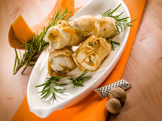 chicken rolled up with pumpkin and rosemary