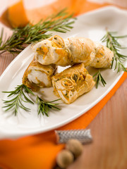 chicken rolled up with pumpkin and rosemary, selective focus