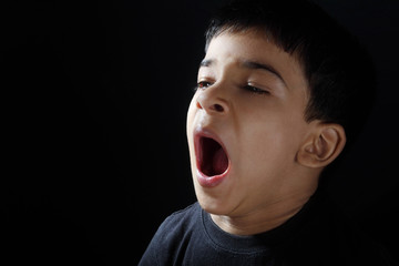 Indian Little Boy Yawning