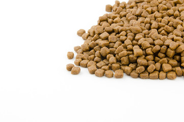 dry cat food on white background