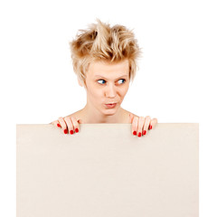 Beautiful young blond girl holding blank white sign