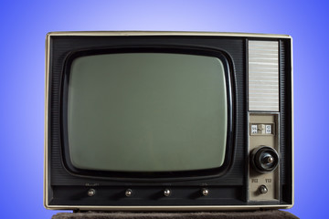 vintage television on blue background