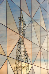 reflected electricity pylon