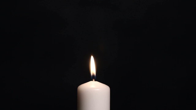 candle and  hand
